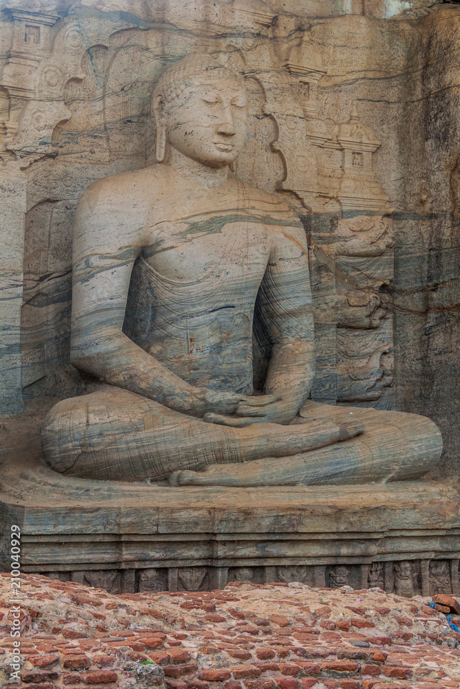 Sitting Buddha statue at Gal Vihara rock temple in the ancient city Polonnaruwa, Sri Lanka