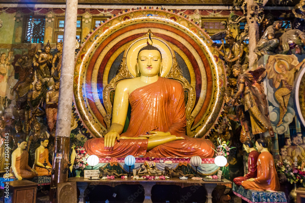 COLOMBO, SRI LANKA - JULY 26, 2016: Buddha statue in Gangaramaya Buddhist Temple in Colombo, Sri Lanka
