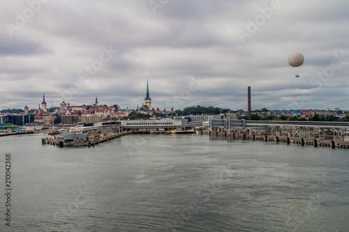 Ferry harbor and a skyline of Tallinn, Estonia