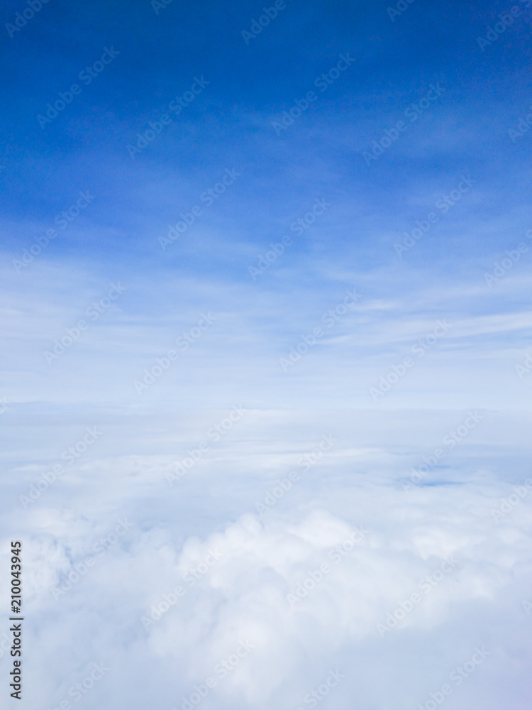 Sunny sky and cloud, view on airplane window Sunny sky and cloud, view on airplane window