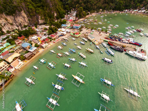 Aerial view of the beach with fishing boats. Elnido, Philippines, 2018.