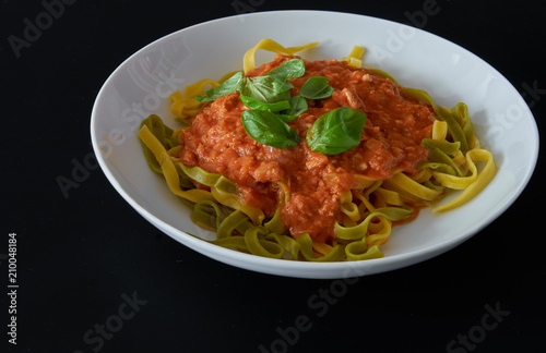 Spaghetti With Tuna, Basil on black table