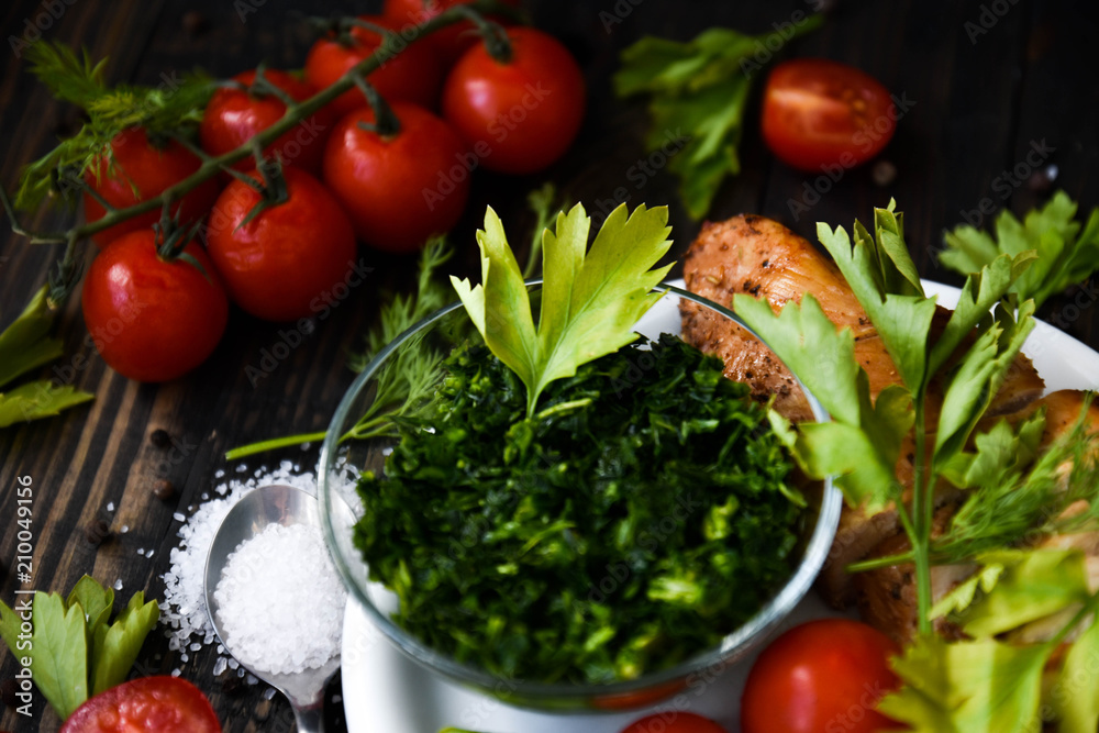 Chicken with tomatoes, parsley and dill. Chicken with tomatoes, parsley and dill.