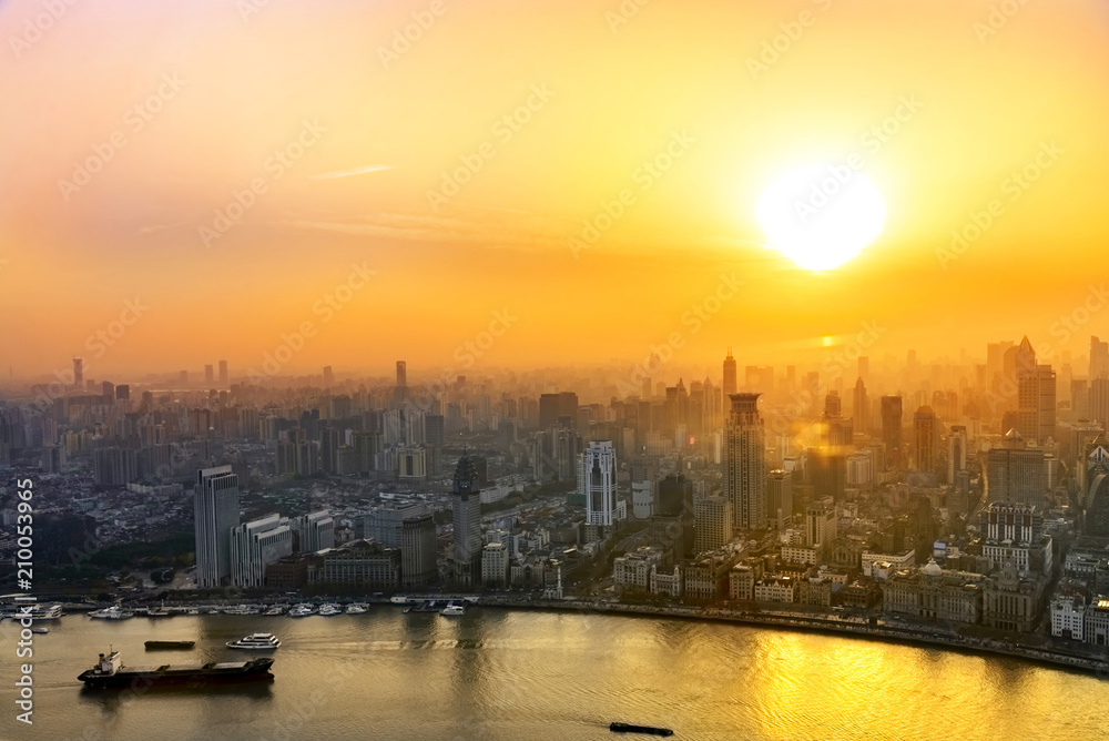 Shanghai cityscape sunset twilight with smog lies over the skyline of Historical architecture and modern skyscraper on the bund of Shanghai, China Shanghai cityscape sunset twilight with smog lies over the skyline of Historical architecture and modern skyscraper on the bund of Shanghai, China