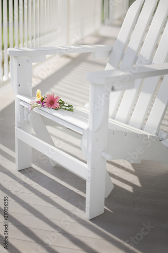 Adirondack chair on a sunny porch