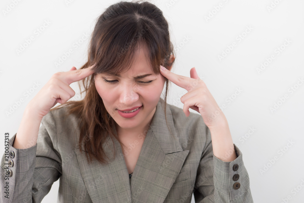 portrait of stressed sick woman with headache; ill woman suffers from vertigo, dizziness, migraine, hangover, health care concept; young adult asian woman model portrait of stressed sick woman with headache; ill woman suffers from vertigo, dizziness, migraine, hangover, health care concept; young adult asian woman model