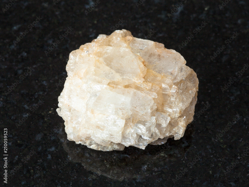 rough Topaz stone on black rough Topaz stone on black