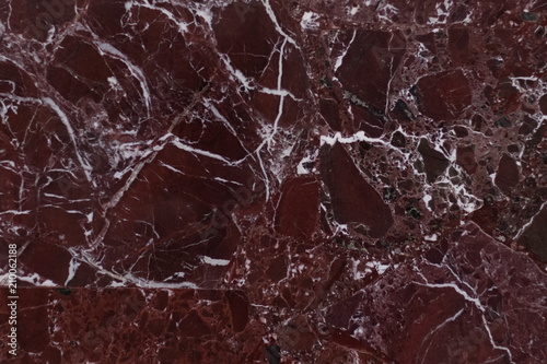 The red marble. Texture.