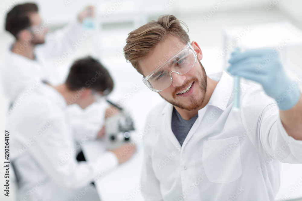 closeup. scientist with beaker closeup. scientist with beaker