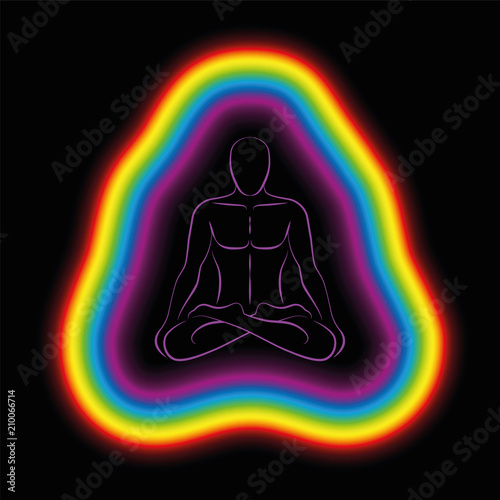 Photo Meditating man in yoga position with colorful aura or subtle body