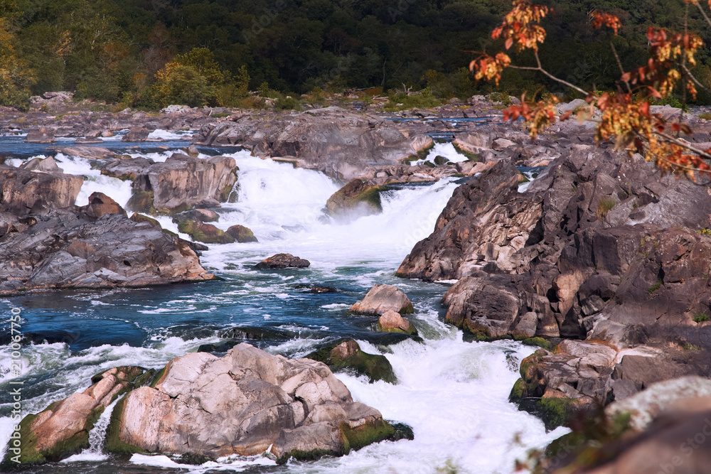 Potomac River. Rapids and Waterfalls. Landscape. Stones and Water Foam. Potomac River. Rapids and Waterfalls. Landscape. Stones and Water Foam.
