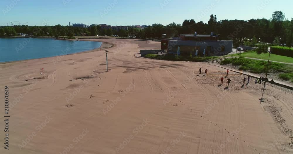Empty beach, C4k aerial view of Hietaranta beach, on a sunny summer morning dawn, in Hietaniemi, Helsinki, Uusimaa, Finland Empty beach, C4k aerial view of Hietaranta beach, on a sunny summer morning dawn, in Hietaniemi, Helsinki, Uusimaa, Finland