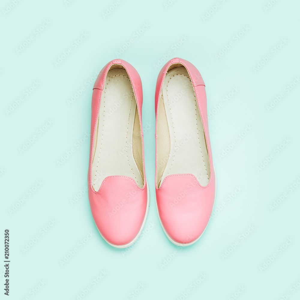 Stylish female shoes in pastel colors. Beauty and fashion concept. Flat lay, top view Stylish female shoes in pastel colors. Beauty and fashion concept. Flat lay, top view