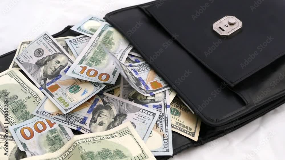 bags and many 100 usd banknotes,black money bag full of dollars in mouth open,
bags and many 100 usd banknotes,black money bag full of dollars in mouth open,