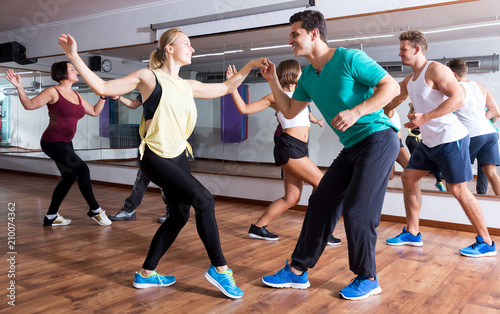 People learning swing at dance class