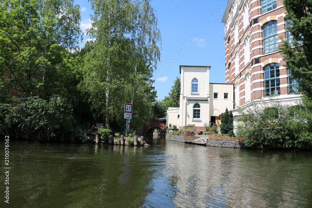 Canal cruise on the river Weiße Elster in Leipzig, Germany Canal cruise on the river Weiße Elster in Leipzig, Germany