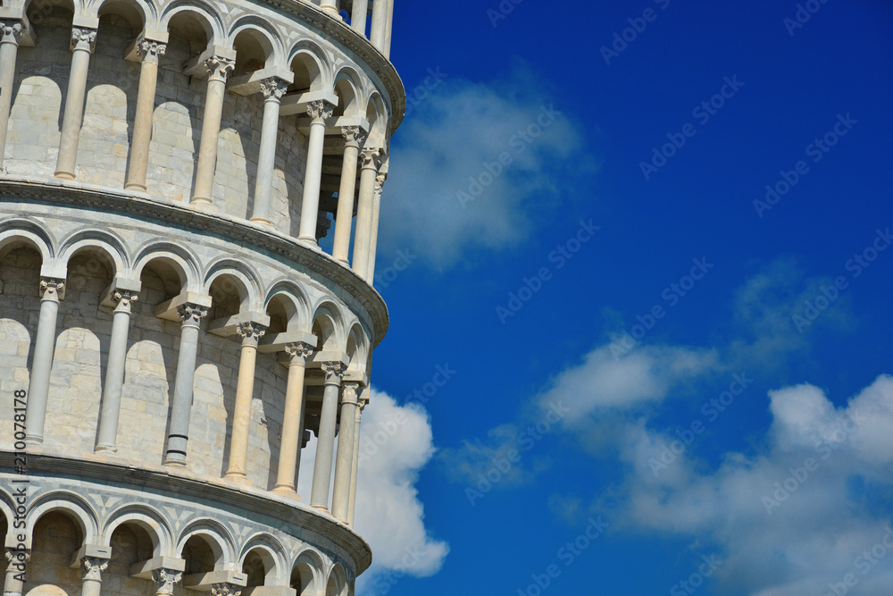 The famous Leaning Tower of Pisa monumental arches (with copy space)