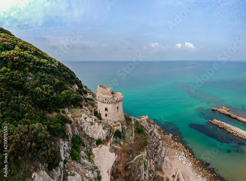 Panoramic landscape with ancient tower in Sabaudia, Lazio, Italy. Scenic resort town village with nice sand beach and clear blue water. Famous tourist destination in Riviera de Ulisse photo