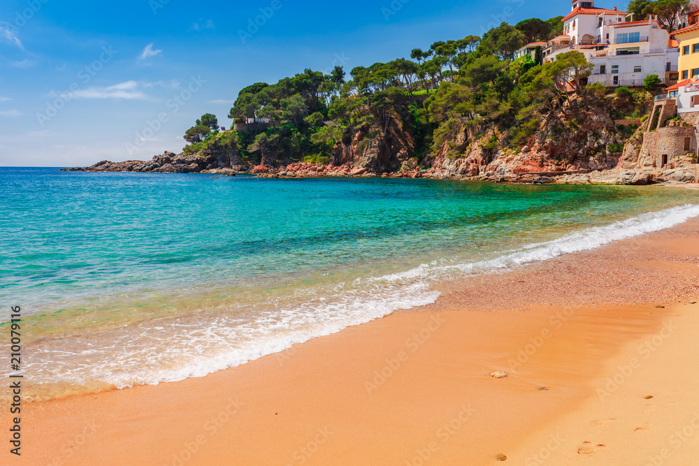 Sea landscape Llafranc near Calella de Palafrugell, Catalonia, Barcelona, Spain. Scenic old town with nice sand beach and clear blue water in bay. Famous tourist destination in Costa Brava Sea landscape Llafranc near Calella de Palafrugell, Catalonia, Barcelona, Spain. Scenic old town with nice sand beach and clear blue water in bay. Famous tourist destination in Costa Brava