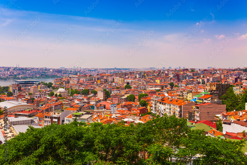 Panoramic view of Istanbul. Panorama cityscape of famous tourist destination Golden Horn bay part of Bosphorus strait. Travel landscape Bosporus, Turkey, Europe and Asia.