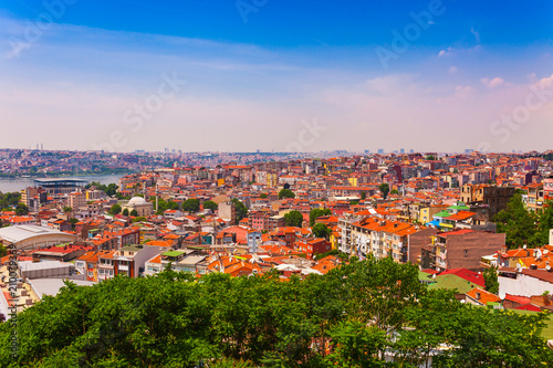Panoramic view of Istanbul. Panorama cityscape of famous tourist destination Golden Horn bay part of Bosphorus strait. Travel landscape Bosporus, Turkey, Europe and Asia.