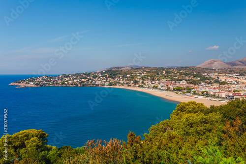 Panoramic sea landscape with Gaeta, Lazio, Italy. Scenic historical town with old buildings, ancient churches, nice sand beach and clear blue water. Famous tourist destination in Riviera de Ulisse