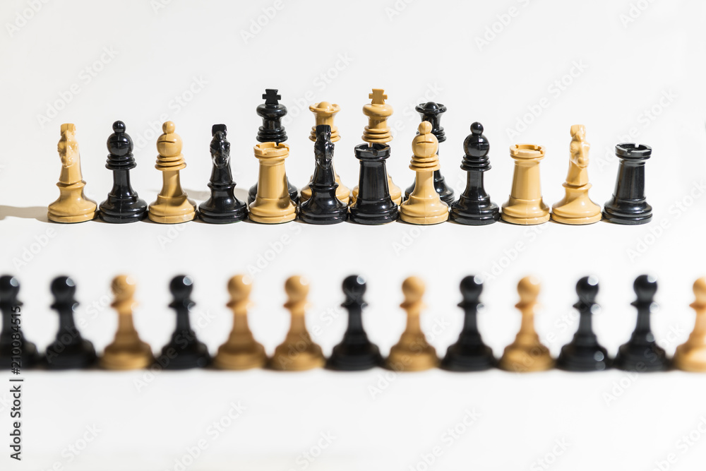 Chess pieces on white background. Chess pieces on white background.