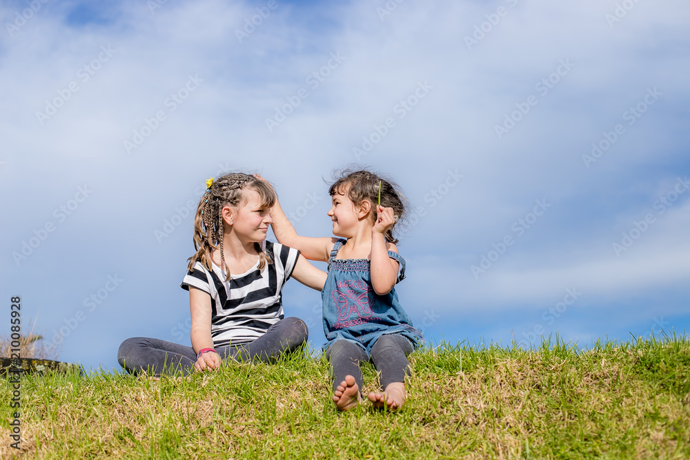 outdoor portrait of young happy child girl having fun on natural background outdoor portrait of young happy child girl having fun on natural background