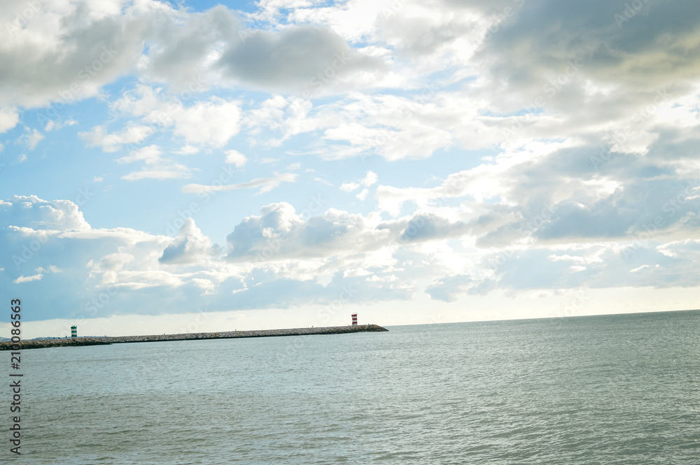 Defocused blurry beautiful sea coastline sun rays light outdoors natural background. Recreational tourism inspirational scenery photograph