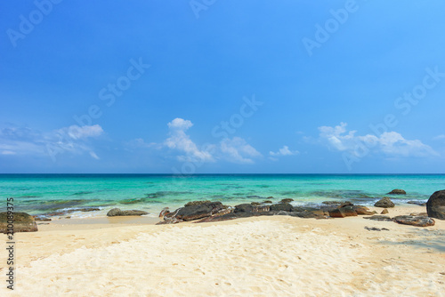 Beautiful beach and tropical sea and rocks in Thailand. © yotrakbutda