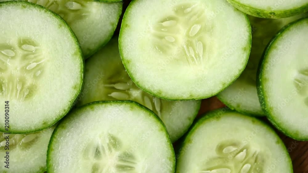 Fresh cucumber slices background Fresh cucumber slices background