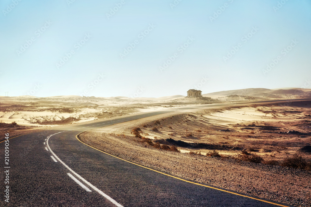 Fototapeta premium Sand Storm Across Lonely Desert Road in Southern Namibia taken in January 2018