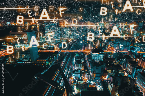 Alphabets with aerial view of Tokyo, Japan at night