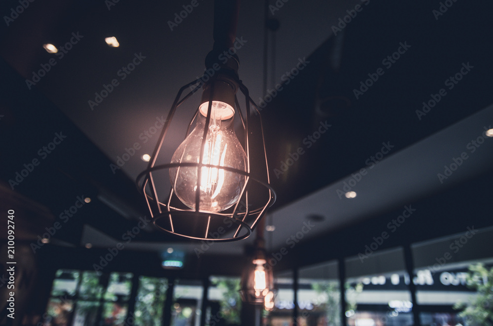 retro light bulb in coffee shop interior view