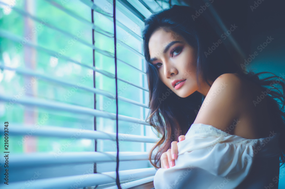 portrait of beside windows looking on photographer portrait of beside windows looking on photographer