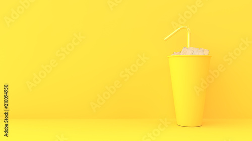 paper cup on yellow pastel background