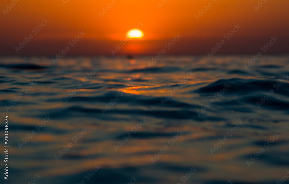 Amazing sea sunset, the sun, waves, clouds