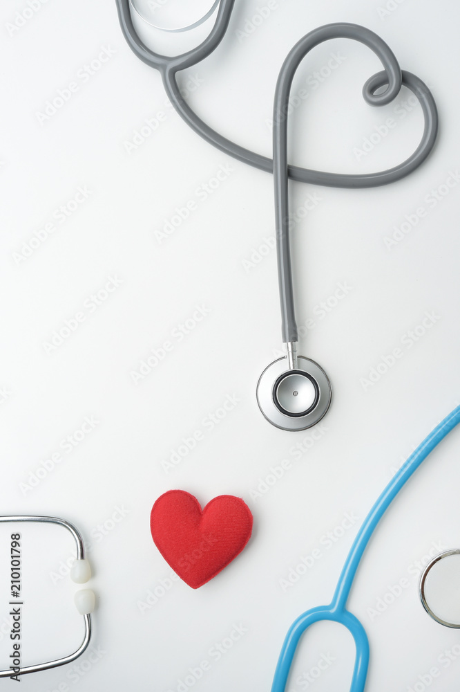 Red heart with stethoscope isolated on white background Red heart with stethoscope isolated on white background