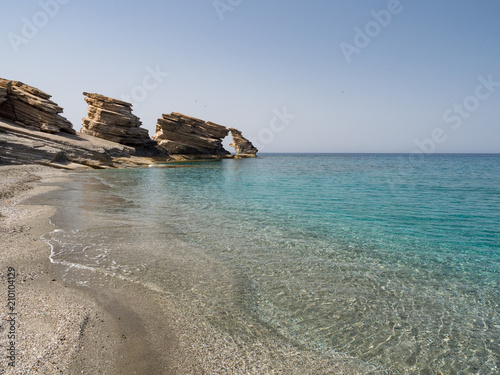 Triopetra rocks and blue water, Crete, Greece. Suitable to be used like a background. June, 2018 photo