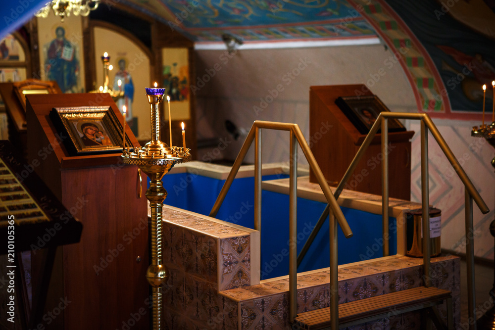 interior in the Russian Orthodox Christian church, icons, candles