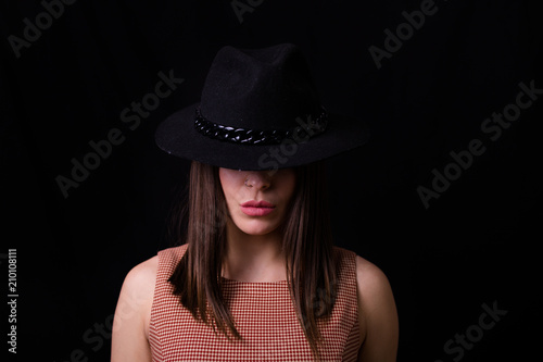 Beautiful woman wearing a wool hat © Tinatin