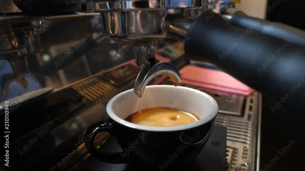 Making coffee cup on espresso machine in a cafe bistro