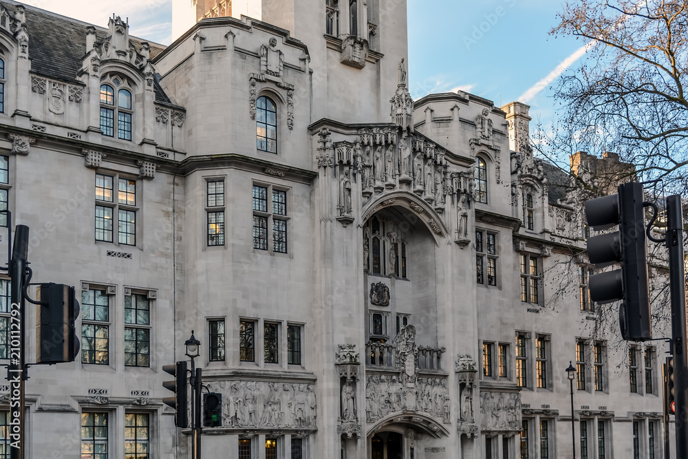 The art nouveau Gothic facade of The Middlesex Guildhall which is the home of the Supreme Court of the UK. The impressive relief frieze and statues are over the entrance