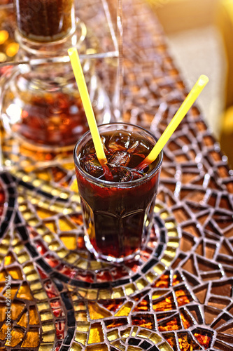 iced coffee with a straw photo