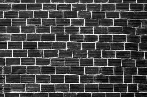 Black brick wall texture . Background.