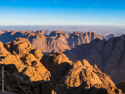Spectacular aerial view of the holy summit of Mount Sinai, Aka Jebel Musa, 2285 meters, at sunrise, Sinai Peninsula in Egypt. Spirituality, religion and history concept.