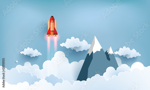 illustration of the shuttle. flying across beautiful clouds at full speed. paper art design