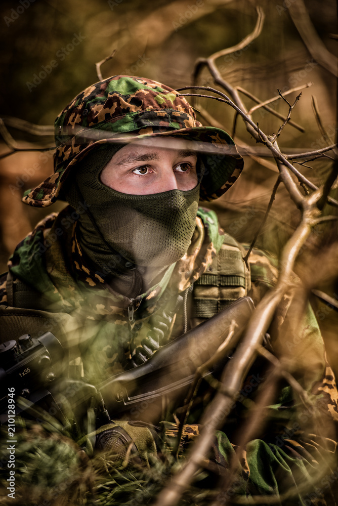 Portrait of an airsoft player