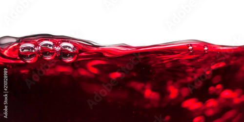 Red wine on white background © Igor Normann
