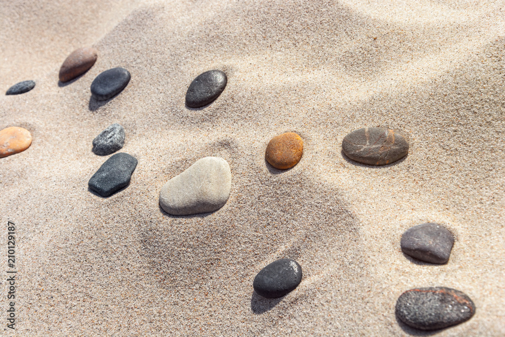 beautiful stones different colours on the sand beautiful stones different colours on the sand